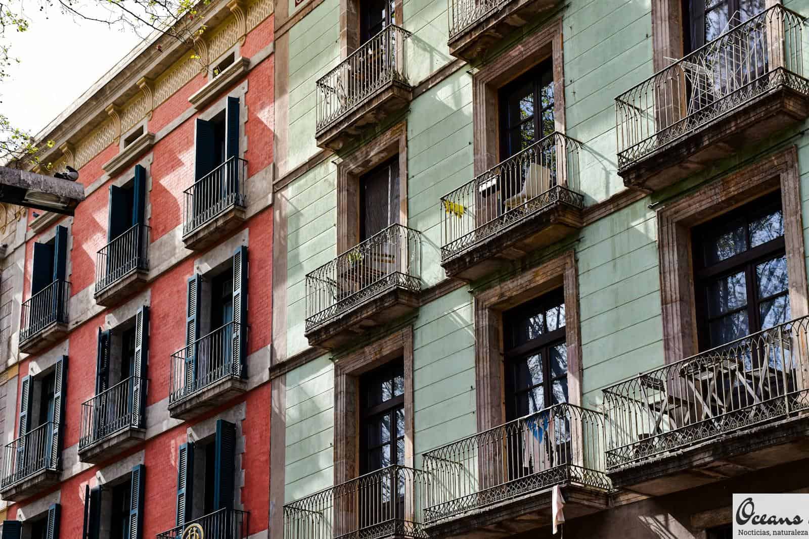 a multi - colored building with balconies and balconies