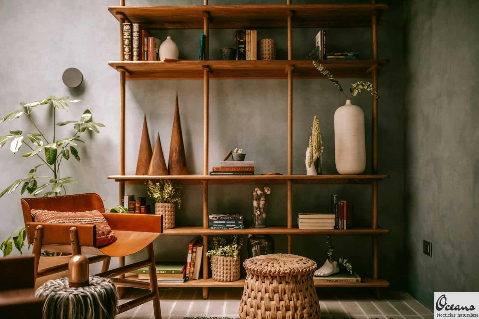 a bookshelf with books and a chair